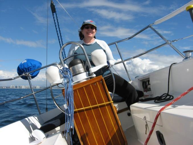 A woman at the helm